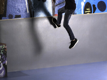 onto the wall